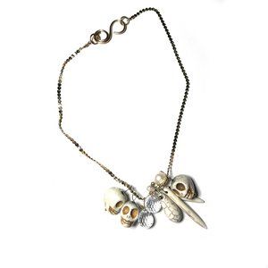Skull resin and metal necklace